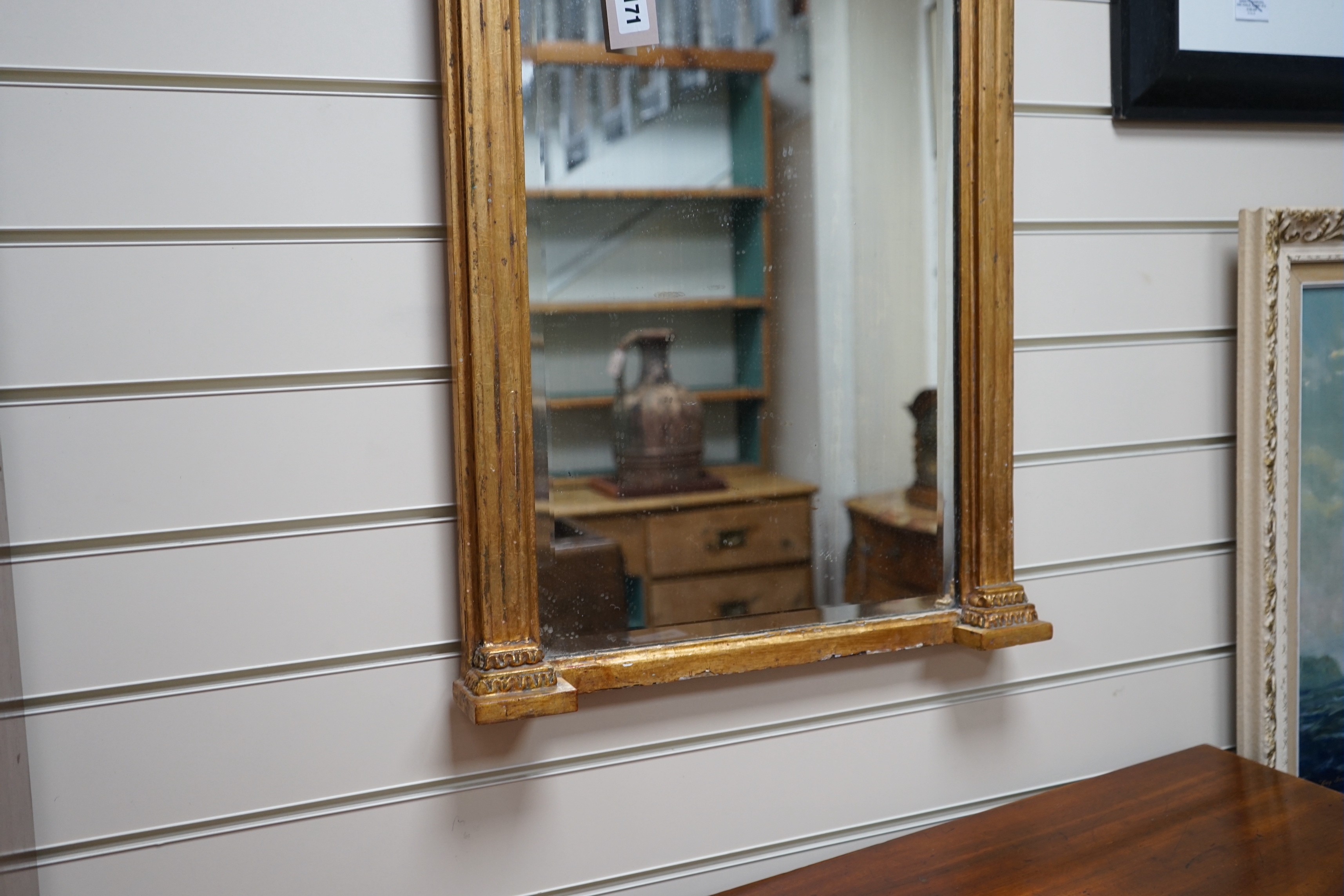 A Regency giltwood and gesso pier glass, width 49cm, height 99cm